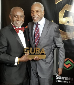 Prof. Oheneba Boachie-Adjei Wins 2019 GUBA Award for exceptional contribution to medicine with Danny Glover